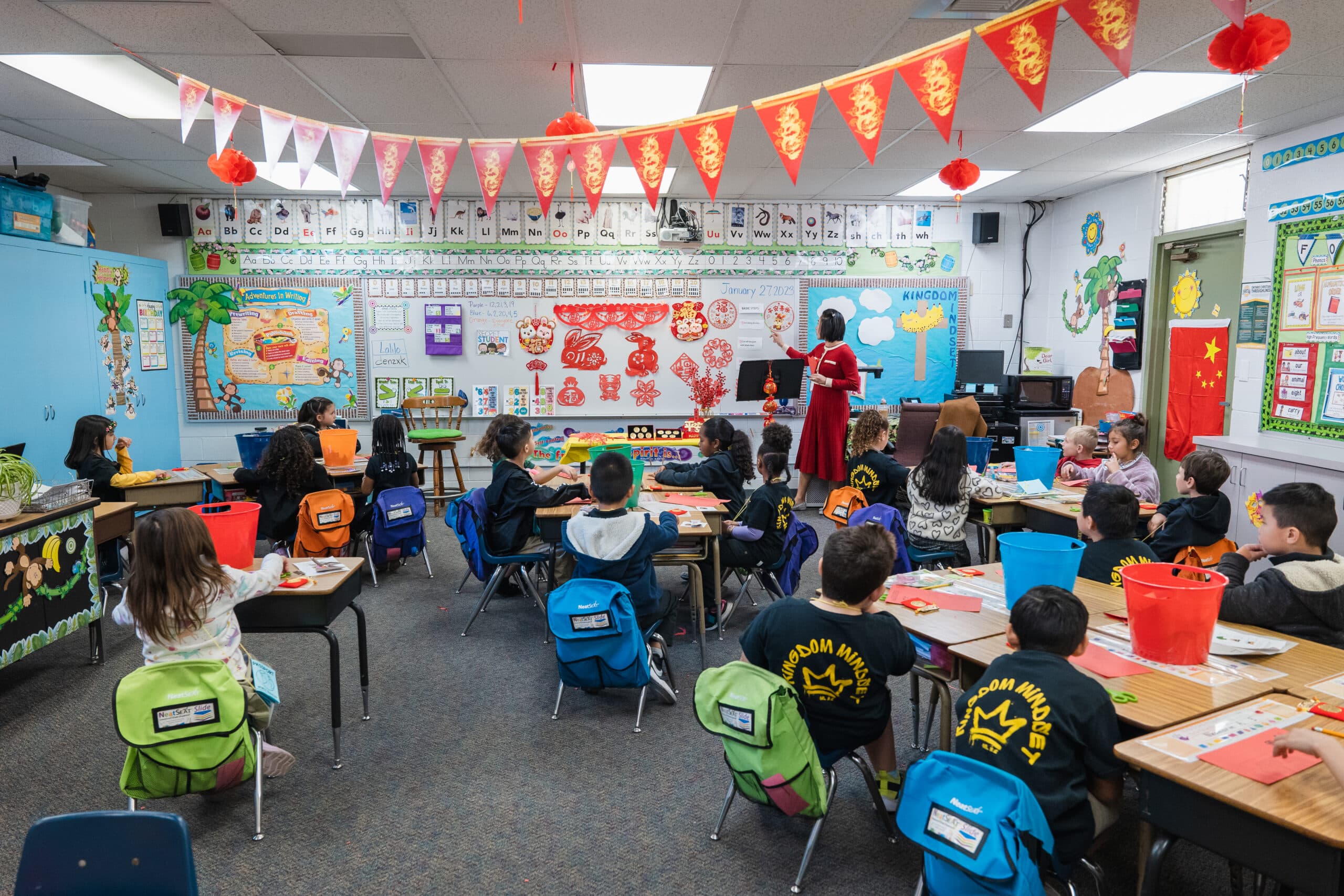 Students and a teacher in a classroom at Ontario Christian School in Ontario, California learning on International Day.